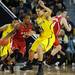 Michigan freshman Mitch McGary guards North Carolina State junior Lorenzo Brown during the first half at Crisler Center on Tuesday night. Melanie Maxwell I AnnArbor.com